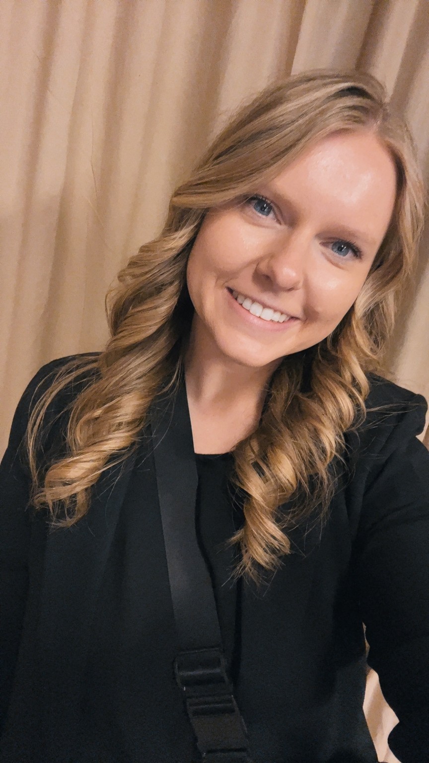 Taylor, owner and wedding coordinator of Enchanted Moments by Taylor