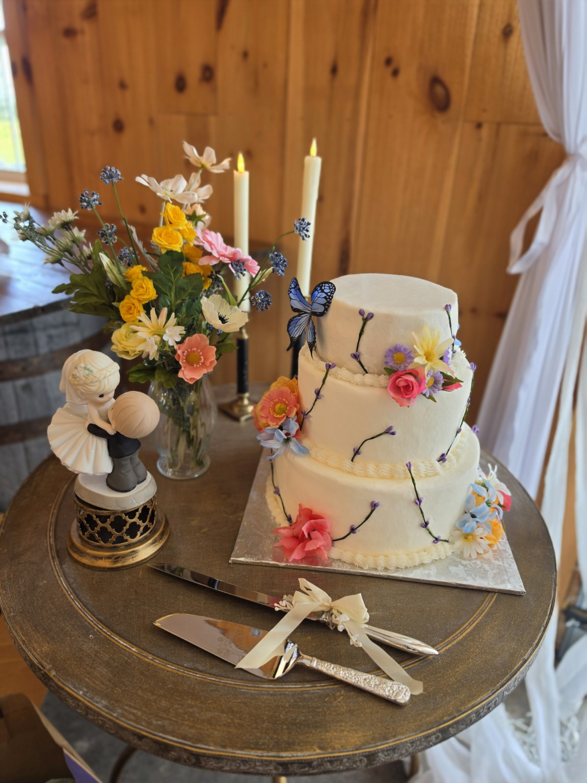 Floral wedding cake with colorful flowers